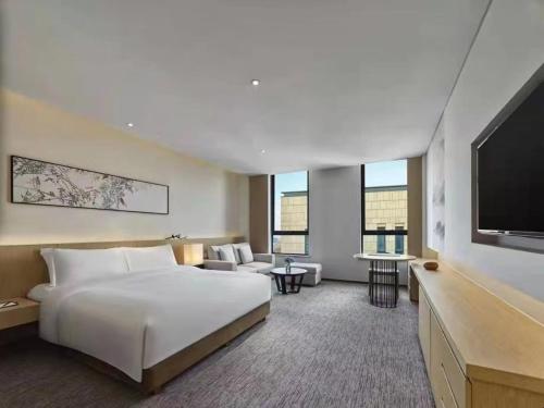 Imagen de la habitación del Hotel Xi\'an Lintong Garrya. Foto 17