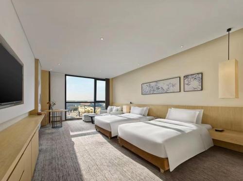 Imagen de la habitación del Hotel Xi\'an Lintong Garrya. Foto 18