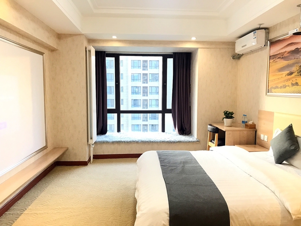 Imagen de la habitación del Hotel Xi'an Phoenix Holiday. Foto 2