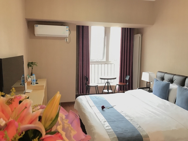 Imagen de la habitación del Hotel Xi'an Phoenix Holiday. Foto 10