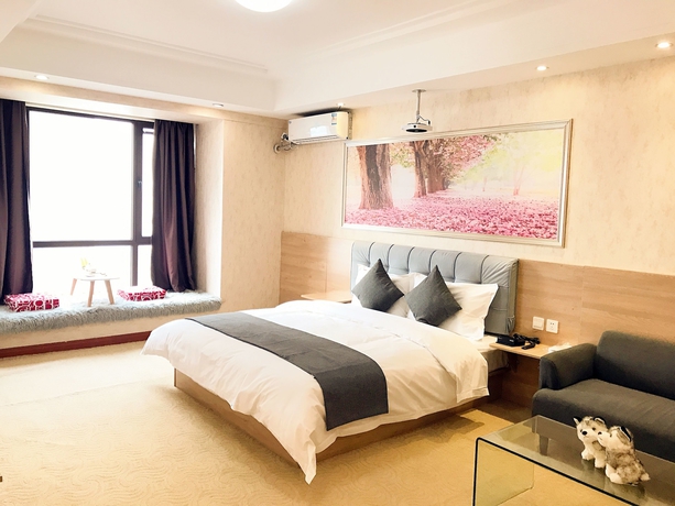 Imagen de la habitación del Hotel Xi'an Phoenix Holiday. Foto 11
