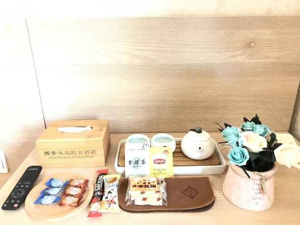 Imagen de la habitación del Hotel Xi'an Phoenix Holiday. Foto 14