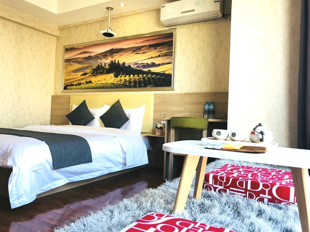 Imagen de la habitación del Hotel Xi'an Phoenix Holiday. Foto 19