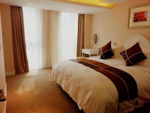 Imagen de la habitación del Hotel Xi'an Qu Jiang Yin Zuo. Foto 10