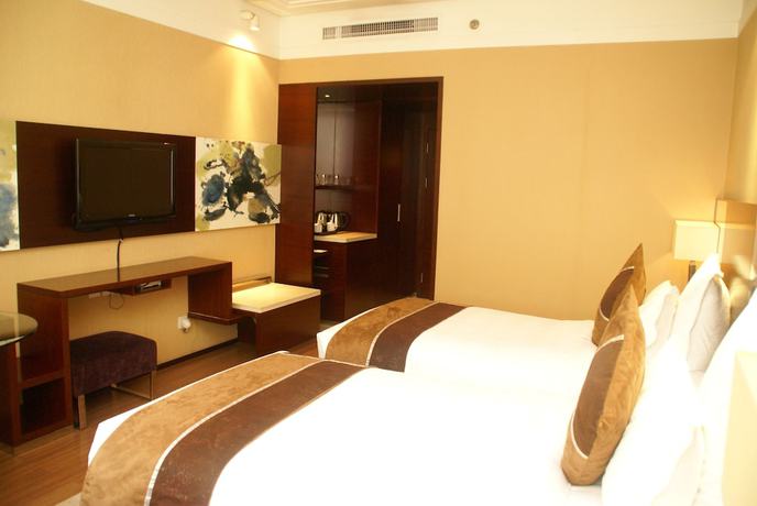 Imagen de la habitación del Hotel Xi'an Qujiang. Foto 2