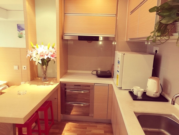 Imagen de la habitación del Hotel Xi'an Tangyun Aparthotel. Foto 11