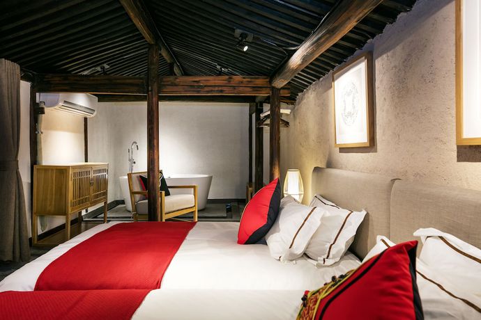 Imagen de la habitación del Hotel Xiananshan Village. Foto 2