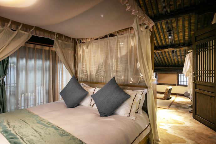 Imagen de la habitación del Hotel Xiananshan Village. Foto 4