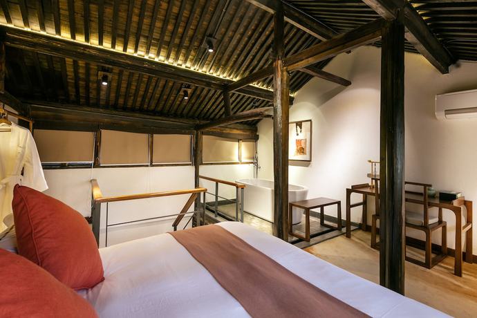 Imagen de la habitación del Hotel Xiananshan Village. Foto 5