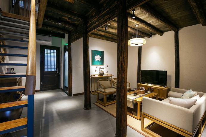 Imagen de la habitación del Hotel Xiananshan Village. Foto 9