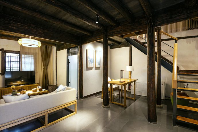 Imagen de la habitación del Hotel Xiananshan Village. Foto 14