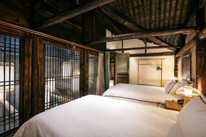 Imagen de la habitación del Hotel Xiananshan Village. Foto 16