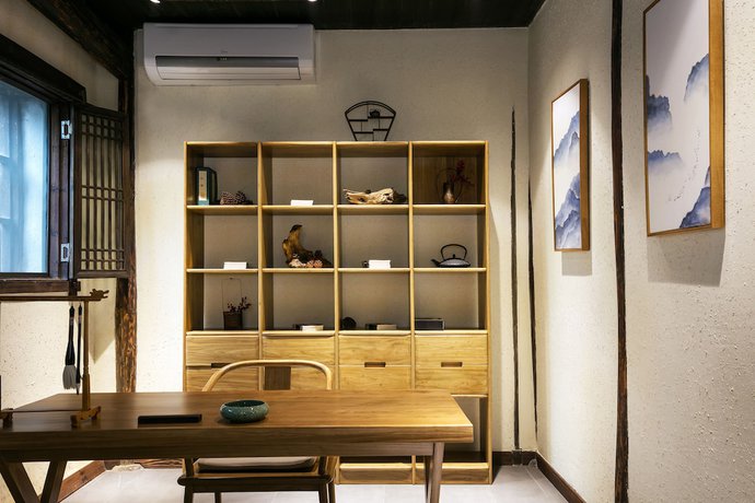 Imagen de la habitación del Hotel Xiananshan Village. Foto 17