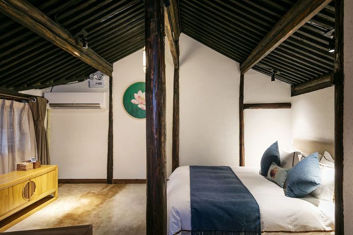 Imagen de la habitación del Hotel Xiananshan Village. Foto 18