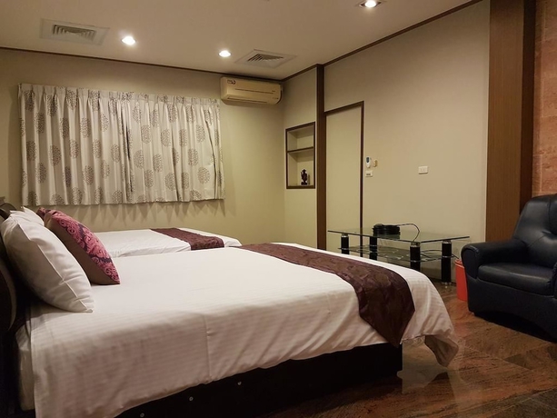 Imagen de la habitación del Hotel Xianfeng BandB. Foto 16