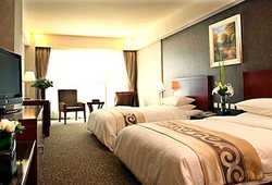 Imagen de la habitación del Hotel Xiang Da International. Foto 3