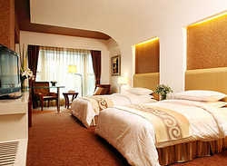 Imagen de la habitación del Hotel Xiang Da International. Foto 4