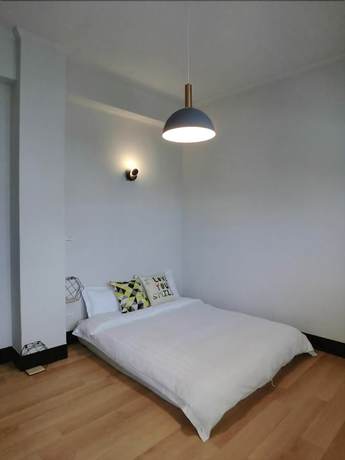 Imagen de la habitación del Hotel Xiang Pin. Foto 8