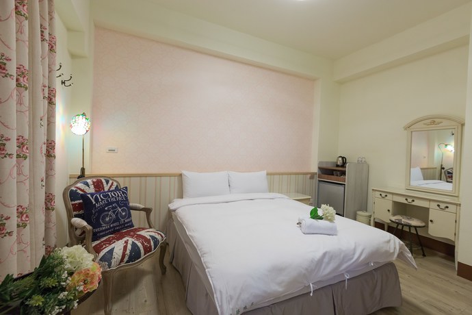 Imagen de la habitación del Hotel Xiang Xiang. Foto 2