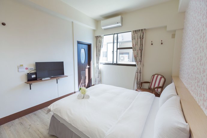 Imagen de la habitación del Hotel Xiang Xiang. Foto 4