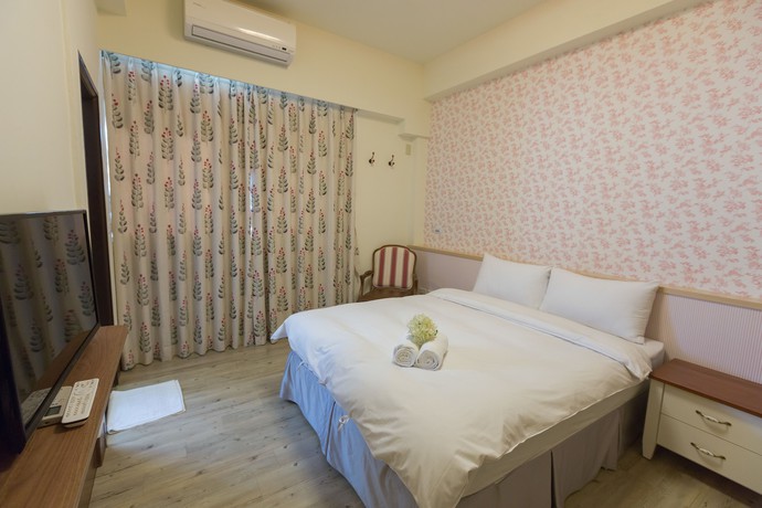 Imagen de la habitación del Hotel Xiang Xiang. Foto 6