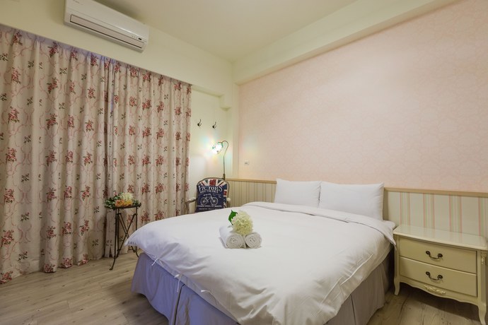 Imagen de la habitación del Hotel Xiang Xiang. Foto 8