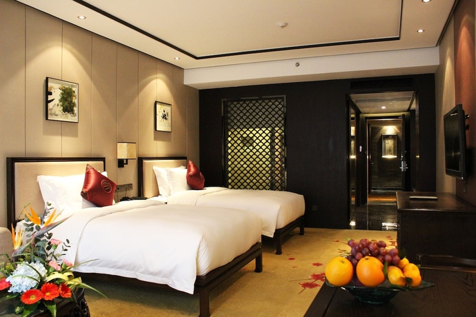 Imagen de la habitación del Hotel Xiang Yun Sha Garden Hotel. Foto 6