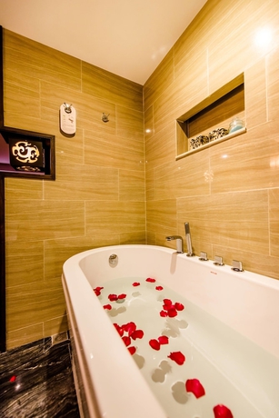 Imagen de la habitación del Hotel Xiang Yun Sha Garden Hotel. Foto 9