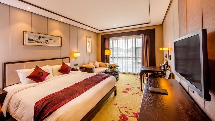 Imagen de la habitación del Hotel Xiang Yun Sha Garden Hotel. Foto 10