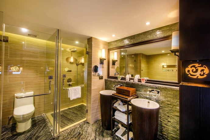 Imagen de la habitación del Hotel Xiang Yun Sha Garden Hotel. Foto 16
