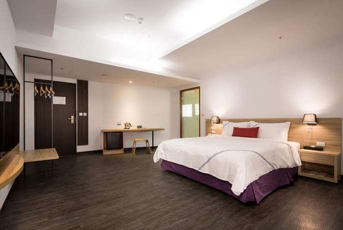 Imagen de la habitación del Hotel Xianghe. Foto 8