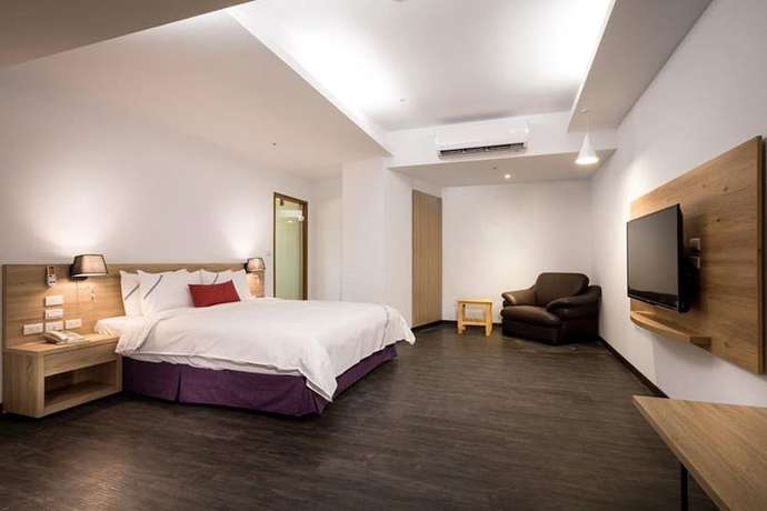 Imagen de la habitación del Hotel Xianghe. Foto 10