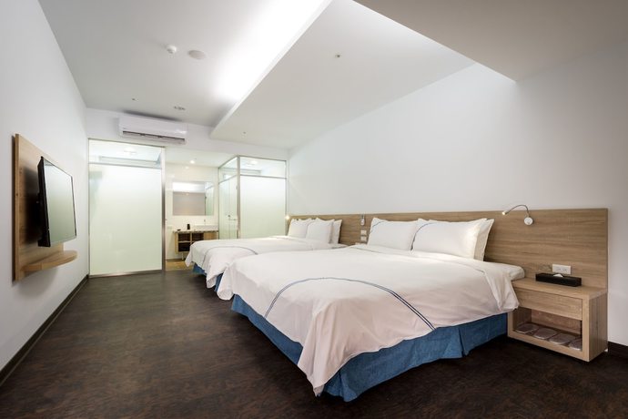 Imagen de la habitación del Hotel Xianghe. Foto 14