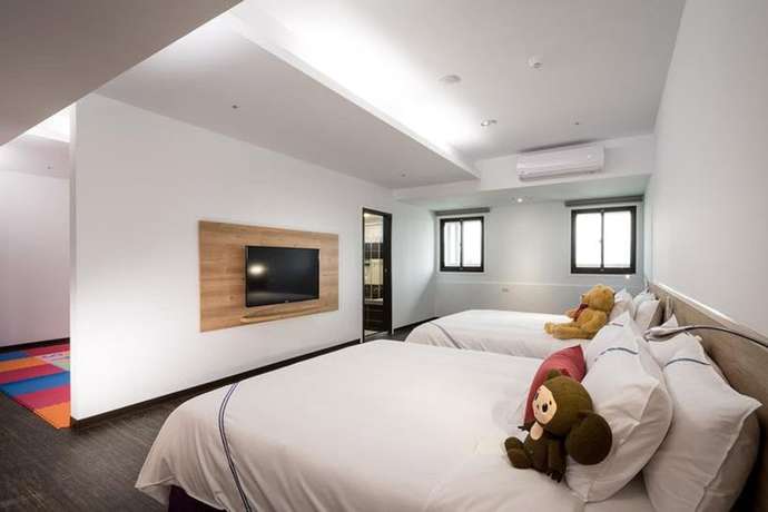 Imagen de la habitación del Hotel Xianghe. Foto 15