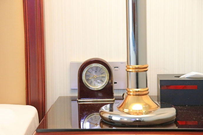 Imagen de la habitación del Hotel Xianglu Grand. Foto 2