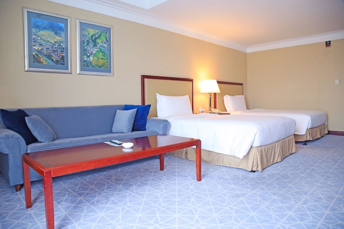 Imagen de la habitación del Hotel Xianglu Grand. Foto 6