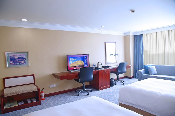 Imagen de la habitación del Hotel Xianglu Grand. Foto 8