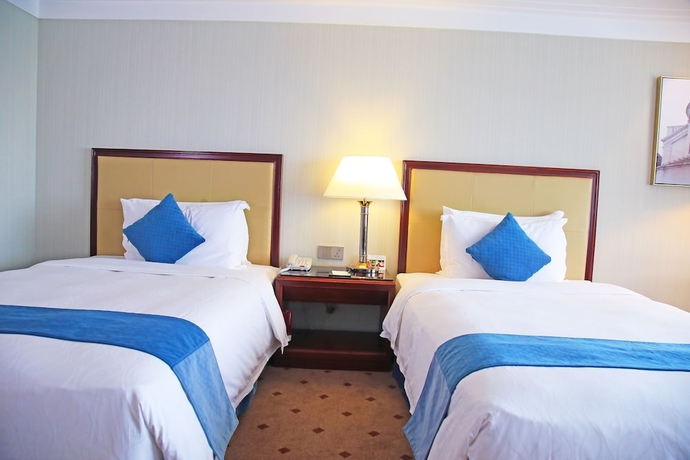 Imagen de la habitación del Hotel Xianglu Grand. Foto 9