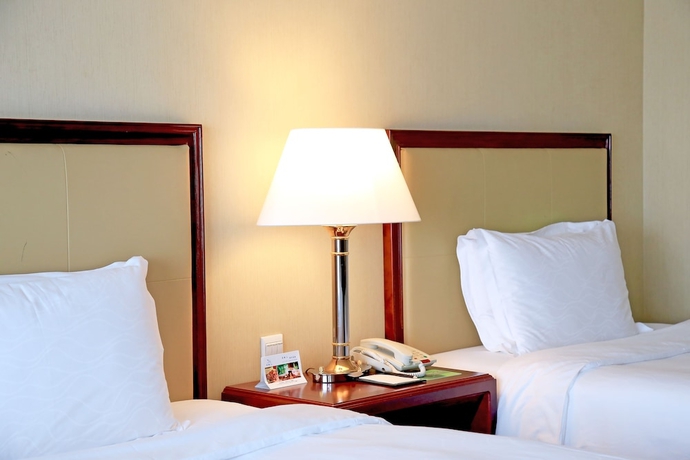 Imagen de la habitación del Hotel Xianglu Grand. Foto 11