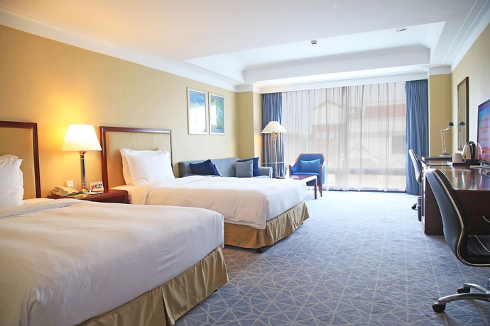 Imagen de la habitación del Hotel Xianglu Grand. Foto 15