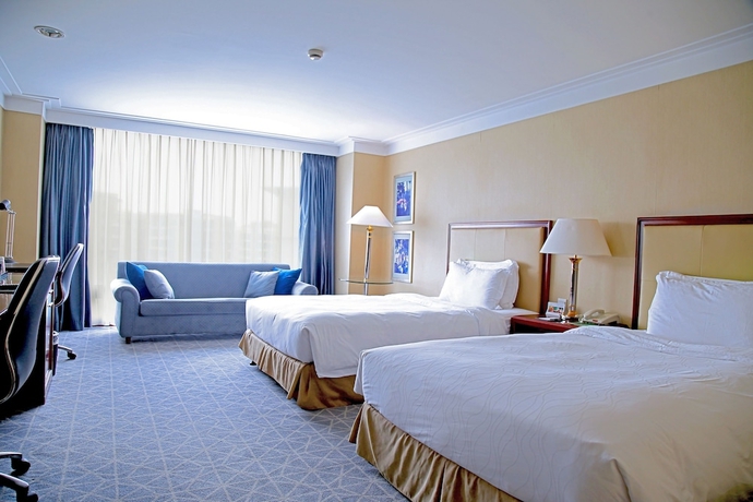 Imagen de la habitación del Hotel Xianglu Grand. Foto 16