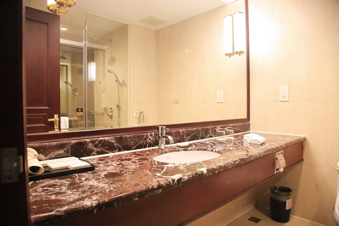 Imagen de la habitación del Hotel Xianglu Grand. Foto 17