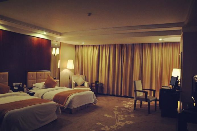 Imagen de la habitación del Hotel Xiangmei International. Foto 9