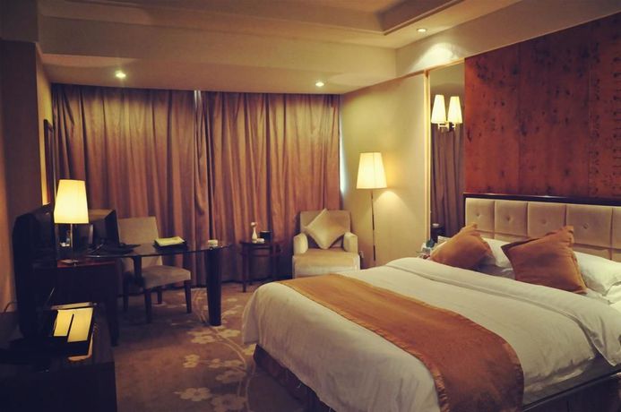 Imagen de la habitación del Hotel Xiangmei International. Foto 10