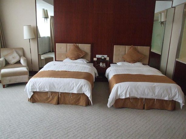 Imagen de la habitación del Hotel Xiangmei International. Foto 11