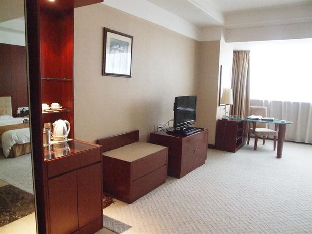 Imagen de la habitación del Hotel Xiangmei International. Foto 12