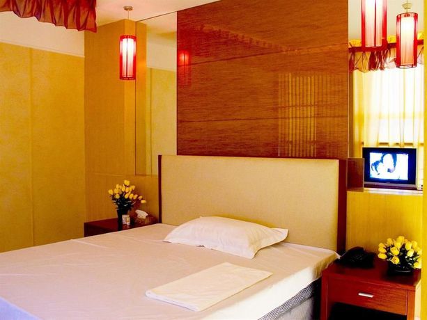 Imagen de la habitación del Hotel Xiangmei International. Foto 14