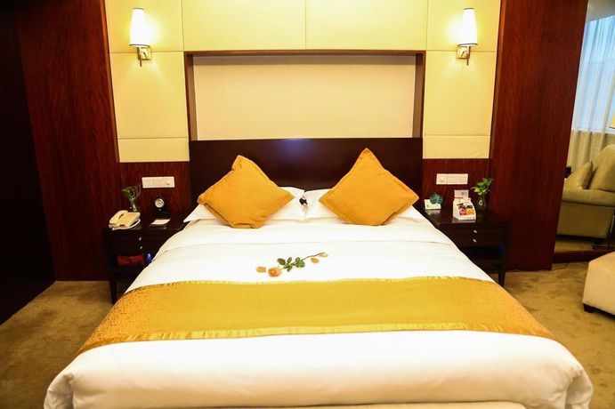 Imagen de la habitación del Hotel Xiangmei International. Foto 15