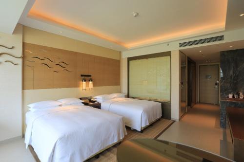 Imagen de la habitación del Hotel Xiangshui Bay Marriott Resort. Foto 8