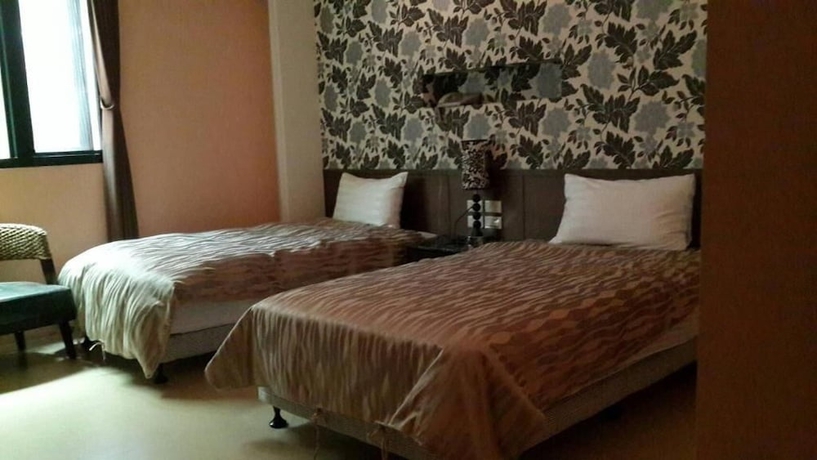 Imagen de la habitación del Hotel Xiangting homestay. Foto 11